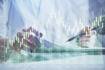 Financial chart drawn over hands taking notes background. Concept of research. Multi exposure