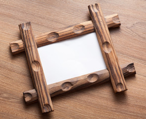 wood frame on desk background, white blank space