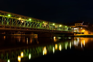 Fototapeta na wymiar Old iron Bridge over Vltava river in Tyn nad Vltavou, Czech Republic.
