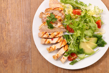 fried chicken breast with salad
