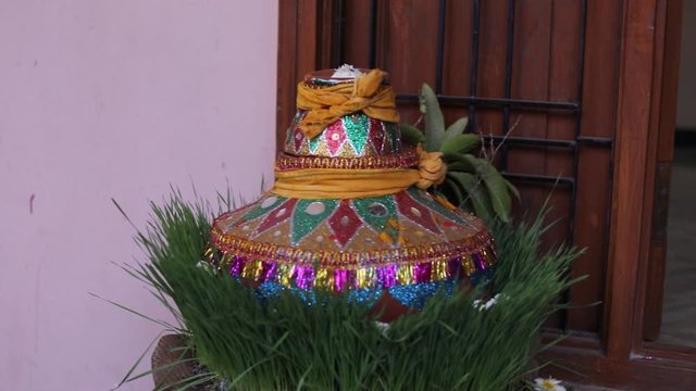Traditional indian wedding ceremony in Hinduism :decorative pitchers in hand  