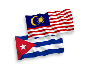 Flags of Cuba and Malaysia on a white background