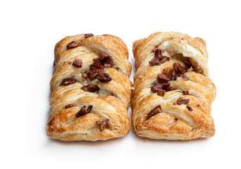 Flaky pastry filled with maple syrup and topped with pecan isolated on white