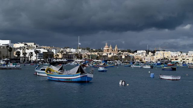 Malta boats in harbor of Marsaxlokk