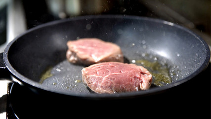 Beef steak fried in pan