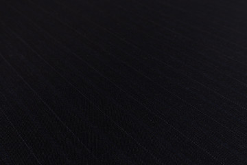 Close up angle of black fabric with textile texture background