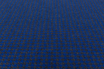 Closeup of tartan blue fabric with textile texture background