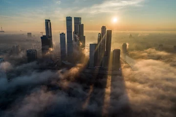 Fotobehang Moskou A aerial view of towers of the Moscow International Business Centre also known as Moscow City at dawn.