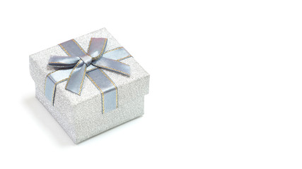 Silver gift box isolated on white background with copyspace