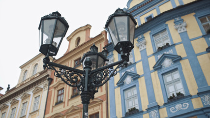 Fototapeta na wymiar View on the buildings and street lantern on the old square in Prague