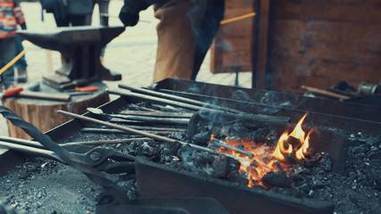 The furnace heats the metal in the fire. The equipment of a blacksmith.