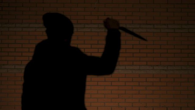 Psychopath with a sharp kitchen knife, serial killer