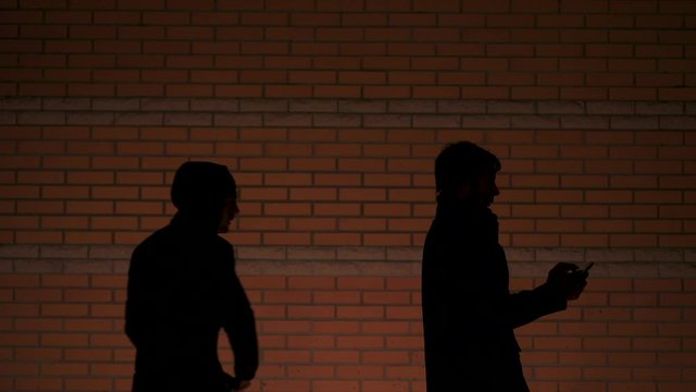 Contract kill - the killer strangles the victim with a plastic bag