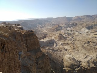 Fototapeta na wymiar Masada National Park, Israel December 23th 2019 - Masada is an ancient fortification in the Southern District of Israel situated on top of an isolated rock plateau, akin to a mesa
