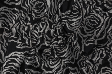 Creative of black fabric with light pattern and textile texture background