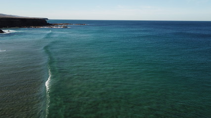Dawn watching the waves of the sea in the Atlantic Ocean