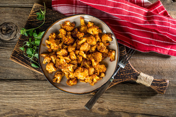 Cauliflower rosettes in a herbal marinade.
