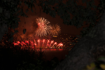 Red fireworks in the distance