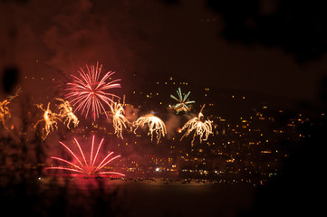 Red fireworks in the distance