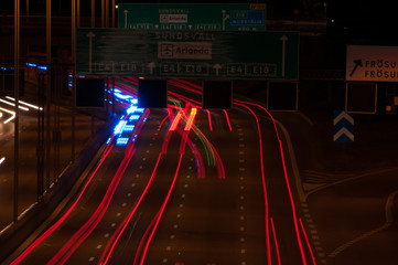 Light streaks from cars driving on a highway