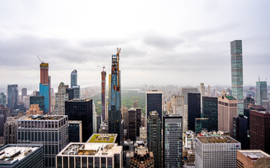 Top of the rock observation desk in rainy day before sunset , Manhattan , New york city