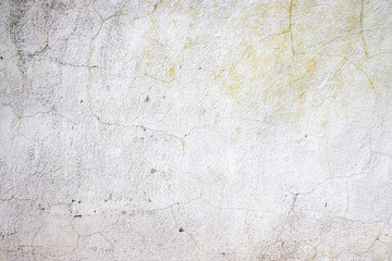 Traces of time left on the wall. Old concrete background. Faded walls. Abstract textures.