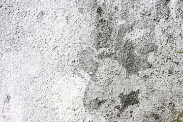 Traces of time left on the wall. Old concrete background. Faded walls. Abstract textures.