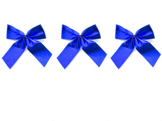 Blue bows isolated on white background. Holiday bows. Gift bows. New Year's ribbons.