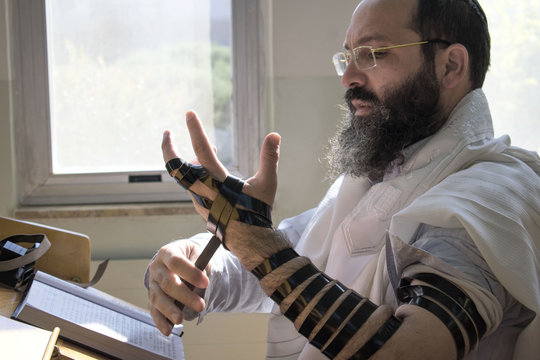 Jewish Prayer, Jew Praying With Tefillin And Tallit