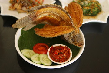 Spicy fried fish. Flying Gurame fish. Selective fokus