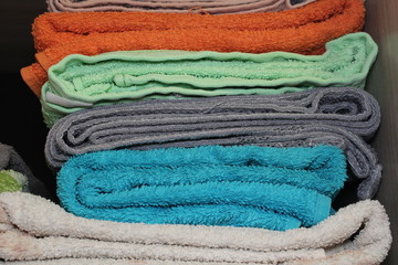 Terry towels, stack on the shelf