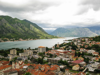 Fototapeta na wymiar view of bay of Kotor and Dobrota area of Kotor city from the path to Castle Of San Giovanni