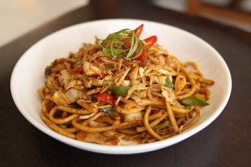 Delicious Fried Noodles with fried onions. Front View