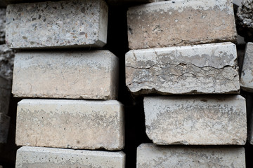 Old cracked pavement rocks stacked