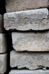 Old cracked pavement rocks stacked