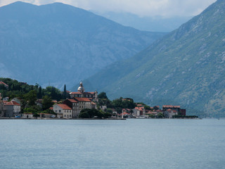 city in Kotor bay on the sunset with beautiful mountains