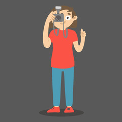 Cartoon photographer with camera and thumb up pushing the button. Vector character taking picture.