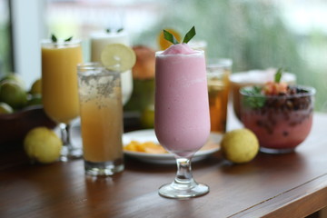 Fresh Juice Orange and Juice Strawberry in a glass