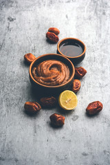 Dates Face mask for supple, smooth and clear skin with ingradients like fresh raw khajoor, lemon and honey. selective focus