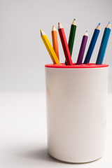 colorful color pencils on white background. multicolor for artist's painting, children's lesson, student's learning