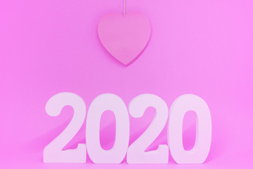 Single or Lonely Pink Heart -  Pink Heart Paper Object on Pink Background - Valentine Day 2020 - Lover Concept  with Copy space     
