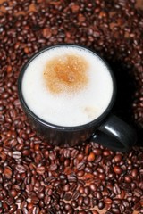 cup of coffee with beans