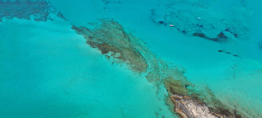 Fototapeta na wymiar Aerial drone ultra wide photo of beautiful tropical exotic paradise Tahiti island turquoise sandy bay