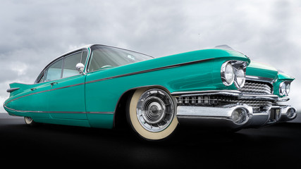 Side view of a classic american car from the fifties. - 312226748