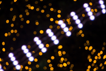 Fototapeta na wymiar Bokeh lights abstract background, Background of Christmas light bokehs decorating
