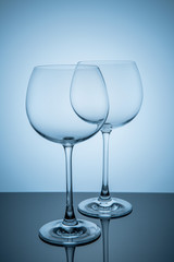 two empty wine glasses for the evening