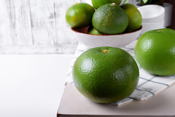 Whole sweetie fruit against the white background