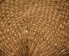 Wicker basket background. Close up of old wicker bamboo fan.