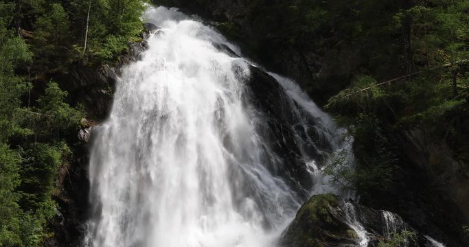 Close up shot of the Schleierfall (veil fall), a huge waterfall in the Hohe Tauern nature reserve in the Austrian Alps in the valley of Kals am Gro&szlig;glockner.