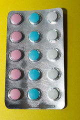 colorful pills in blister silver, vitamin C, various trace elements